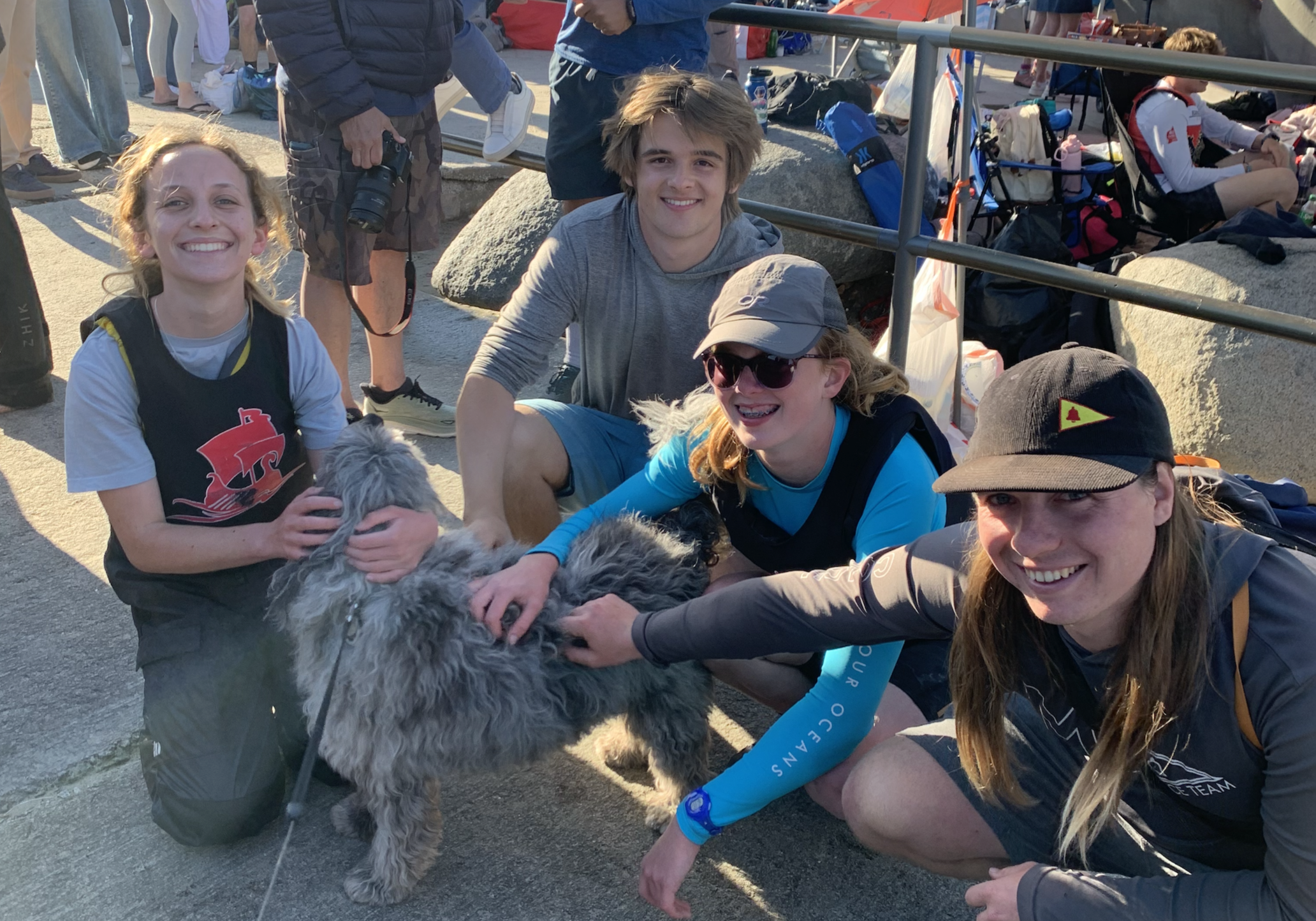 LJHS sailors huddled around the team mascot, Thatcher (Trevor's dog)!