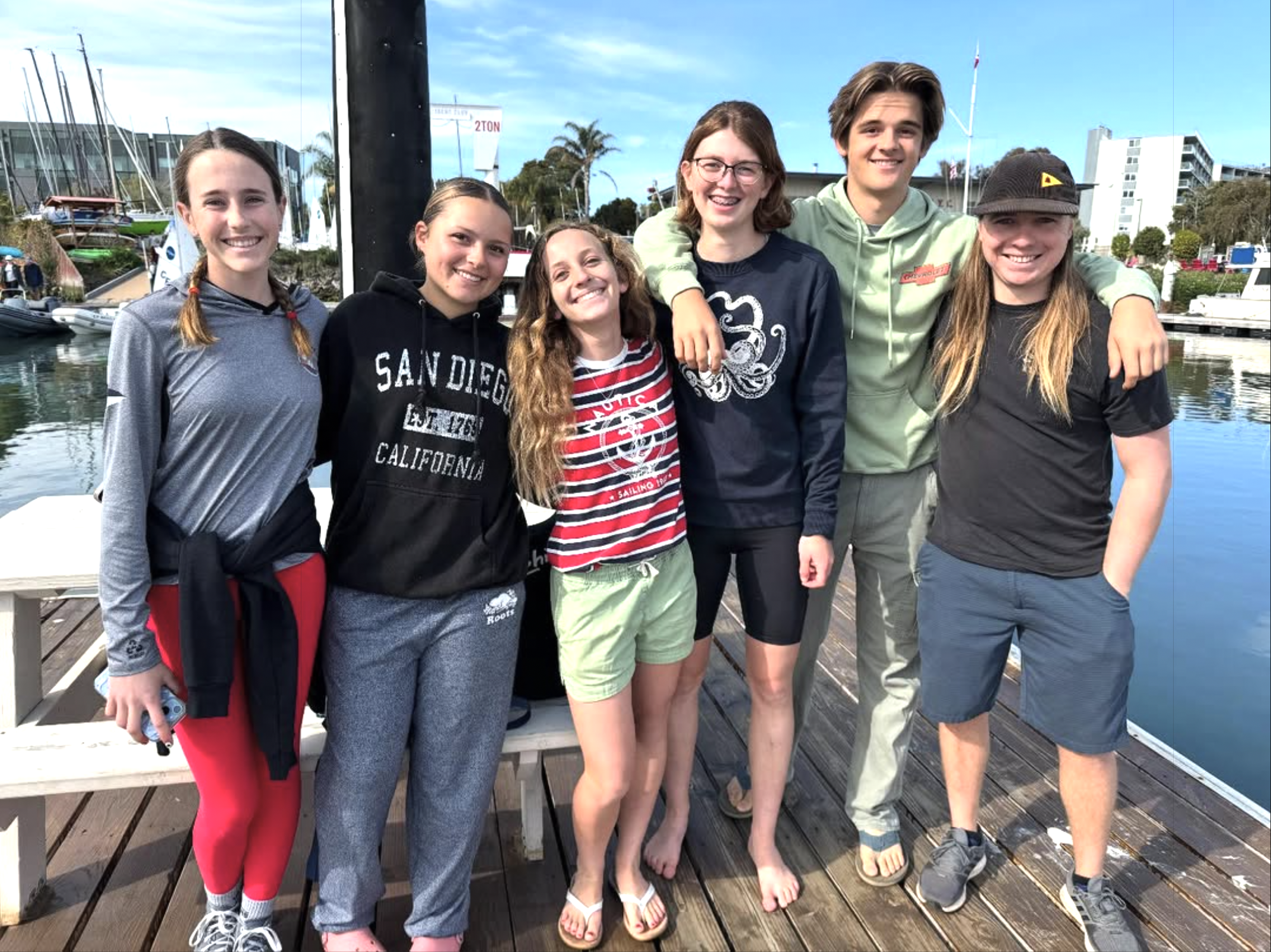 LJHS sailing team group photo with five happy sailors and coach.