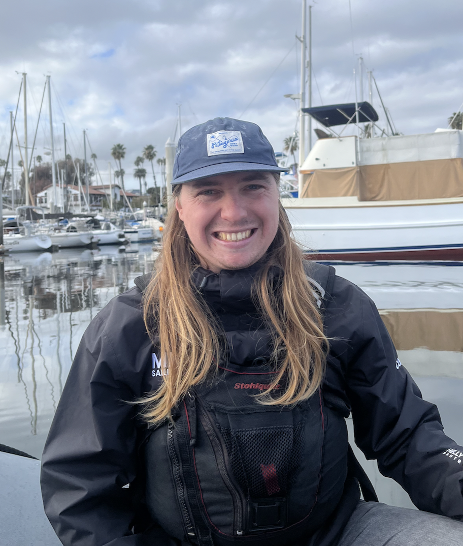 Photo of Coach Josh smiling in his coach boat on our way back from SoCal #4.