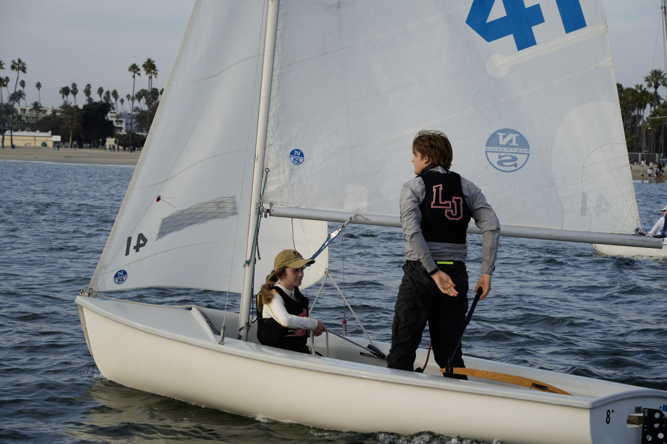 Two La Jolla High School sailors in an FJ sailboat during the Rose Bowl Regatta